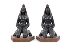 Pair of Egyptian Carved Ebonized Kneeling Figures