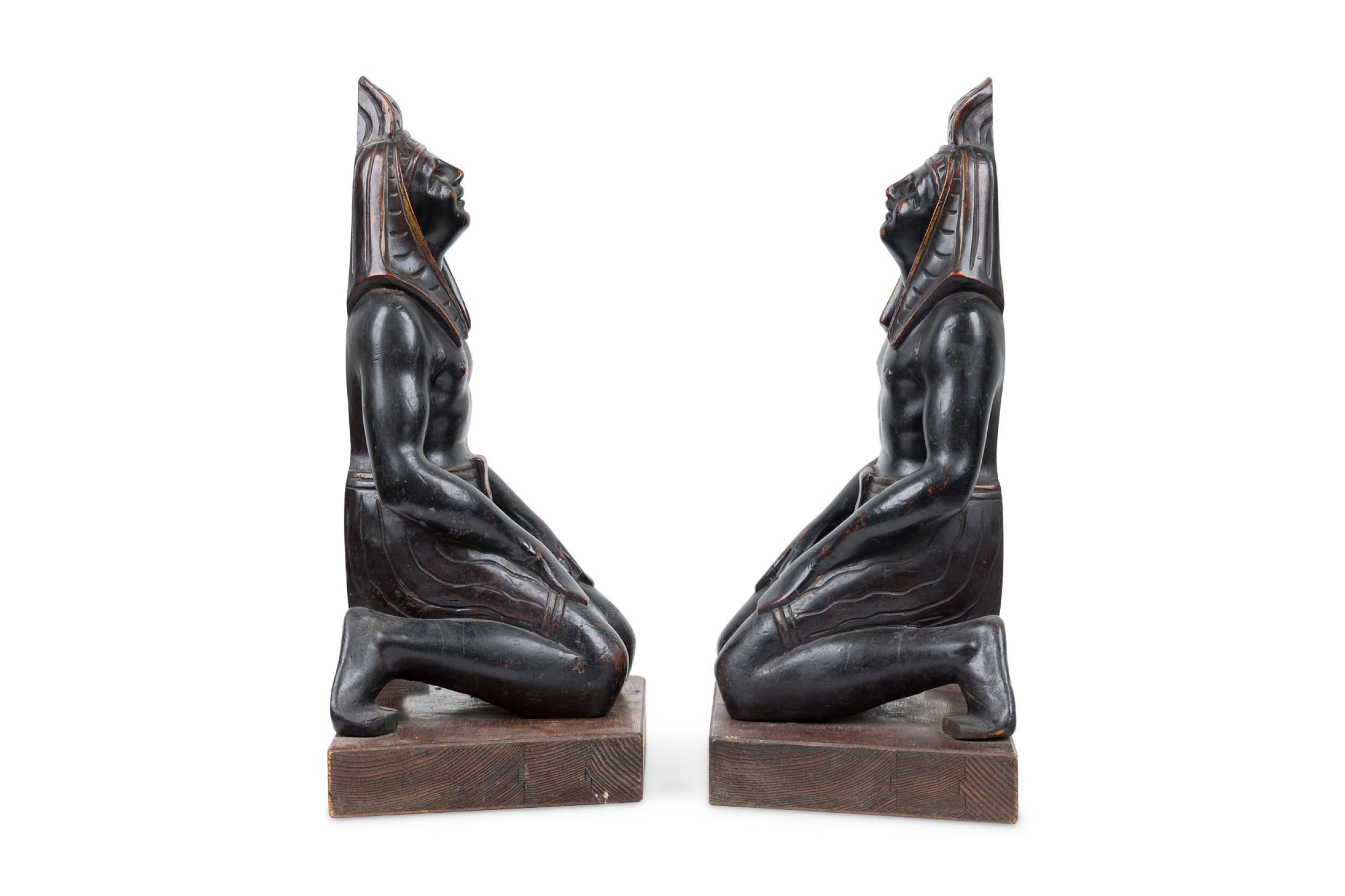 Hand-Carved Pair of Egyptian Carved Ebonized Kneeling Figures For Sale