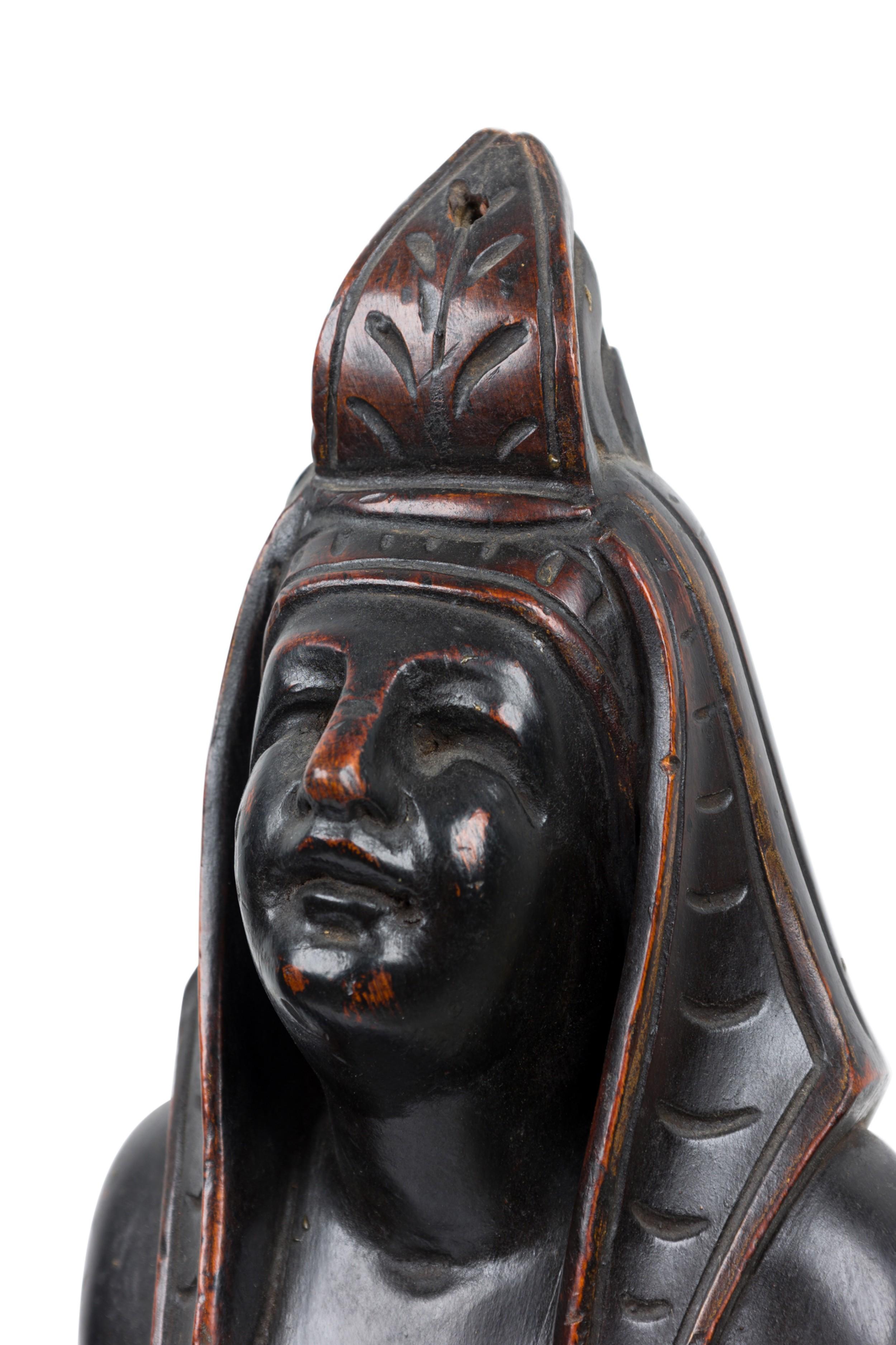 Pair of Egyptian Carved Ebonized Kneeling Figures In Good Condition For Sale In Queens, NY