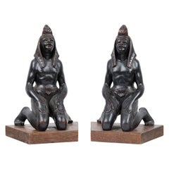 Pair of Egyptian Carved Ebonized Kneeling Figures