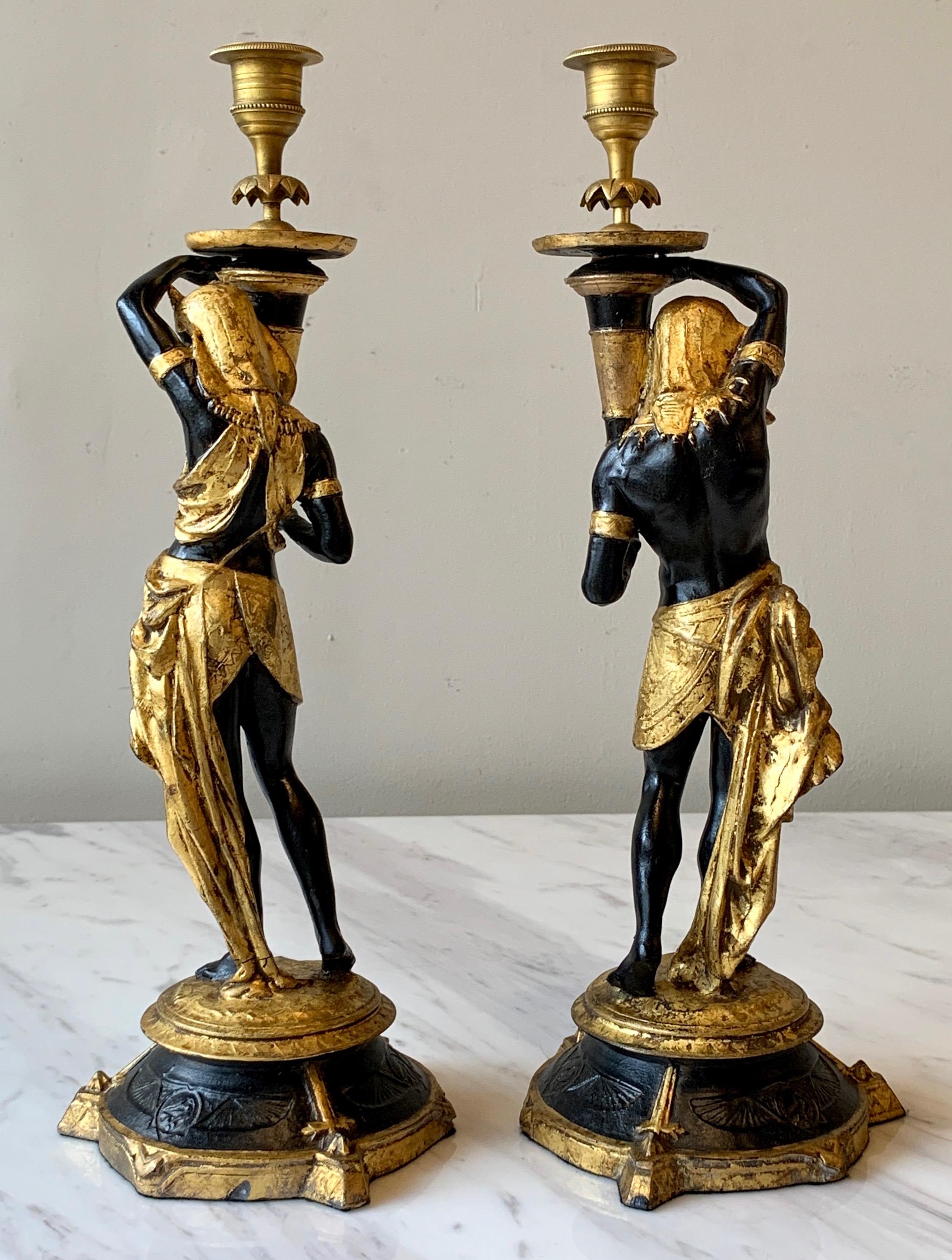 Cast Pair of Egyptian Revival Candlesticks