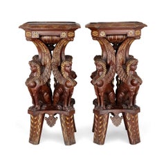 Pair of Egyptian Revival carved and gilt wooden pedestals