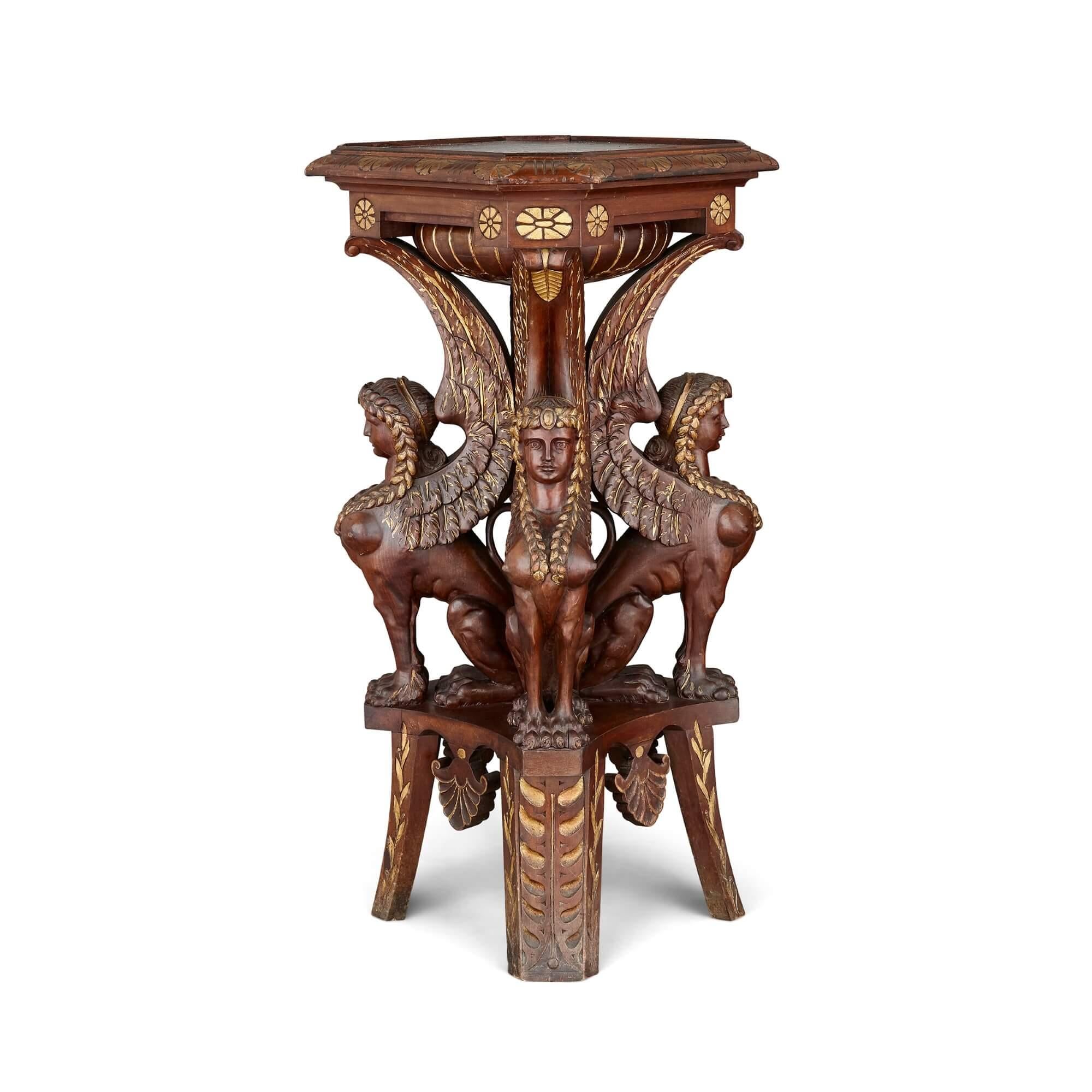 Carved Pair of Egyptian Revival carved and gilt wooden pedestals For Sale