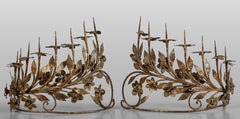 Pair of eight-light antique vintage Italian candelabrum in wrought gilded iron