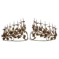 Pair of eight-light antique vintage Italian candelabrum in wrought gilded iron