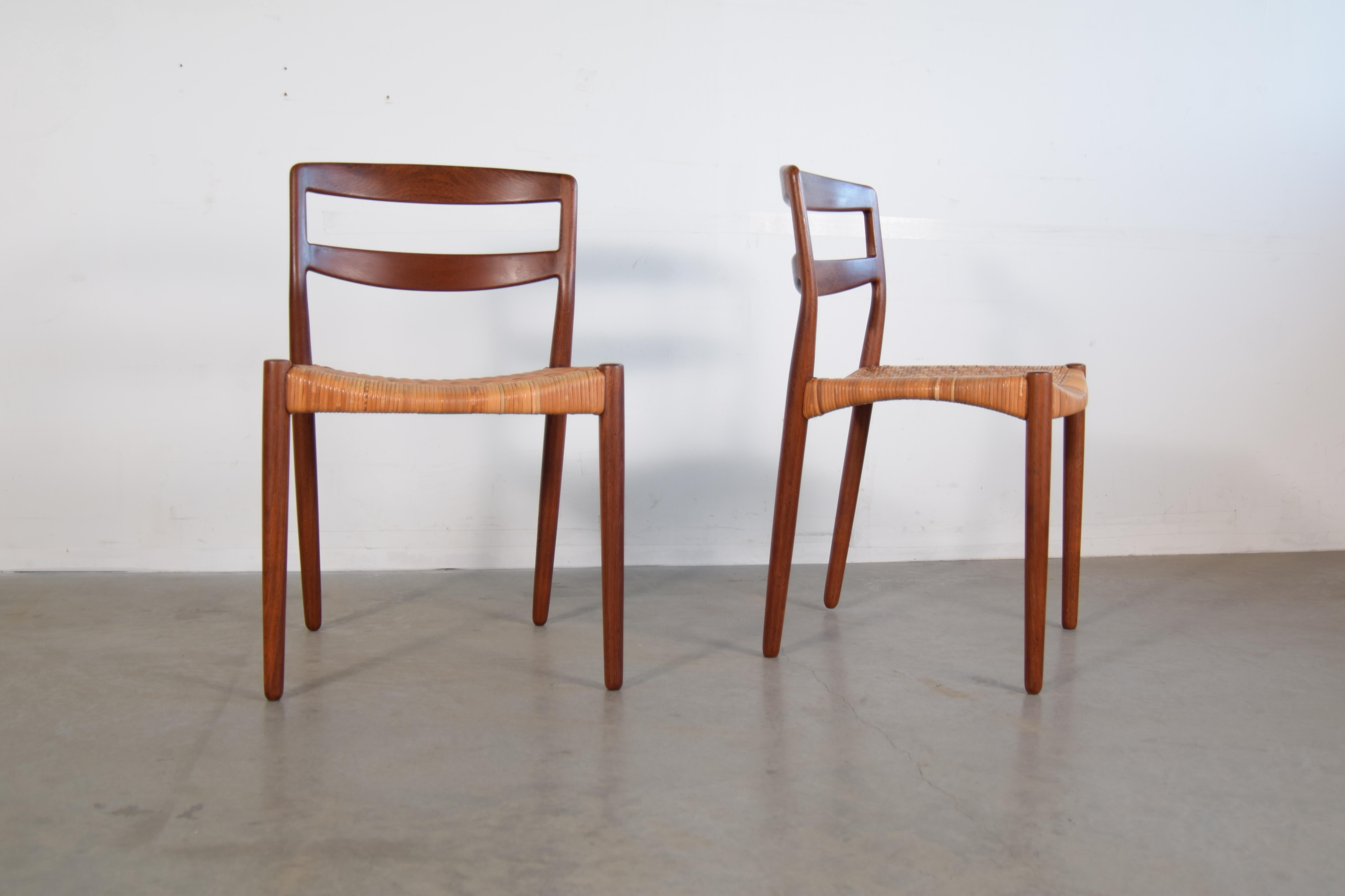 Pair of sculptural teak and cane side chairs designed by Ejner Larsen and Aksel Bender Madsen, circa 1956, and executed by Willy Beck in Copenhagen, Denmark. 

Ejner Larsen was born in Copenhagen on 30 March 1917. After training as a cabinetmaker,