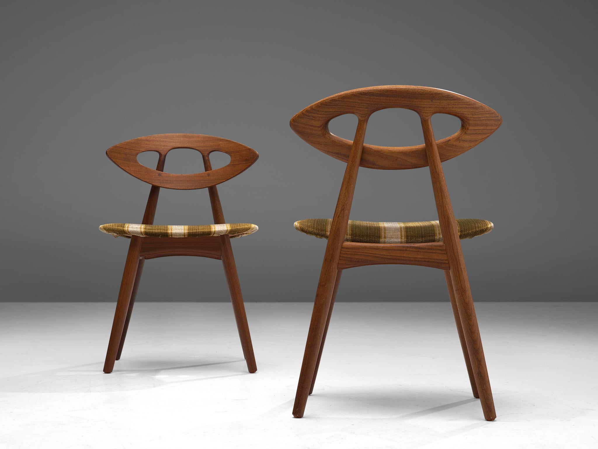 Ejvind A. Johansson for Ivan Gern Møbelfabrik, set of two dining chairs model 84 'Eye,' teak and fabric, Denmark, design 1961, later production

Wonderful and exclusive set of 'Eye' chairs by Danish designer Ejvind Johansson. Characteristic is the