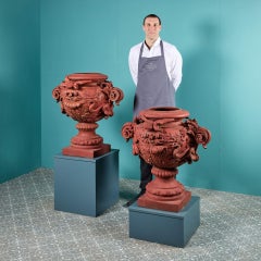 Pair of Elaborate Antique Cast Iron Urns