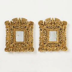 Pair of Elaborately Carved 19th century Giltwood Mirrors
