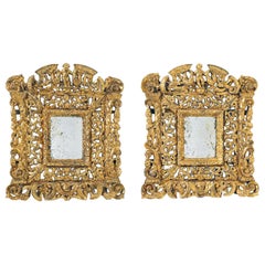 Pair of Elaborately Carved 19th century Giltwood Mirrors