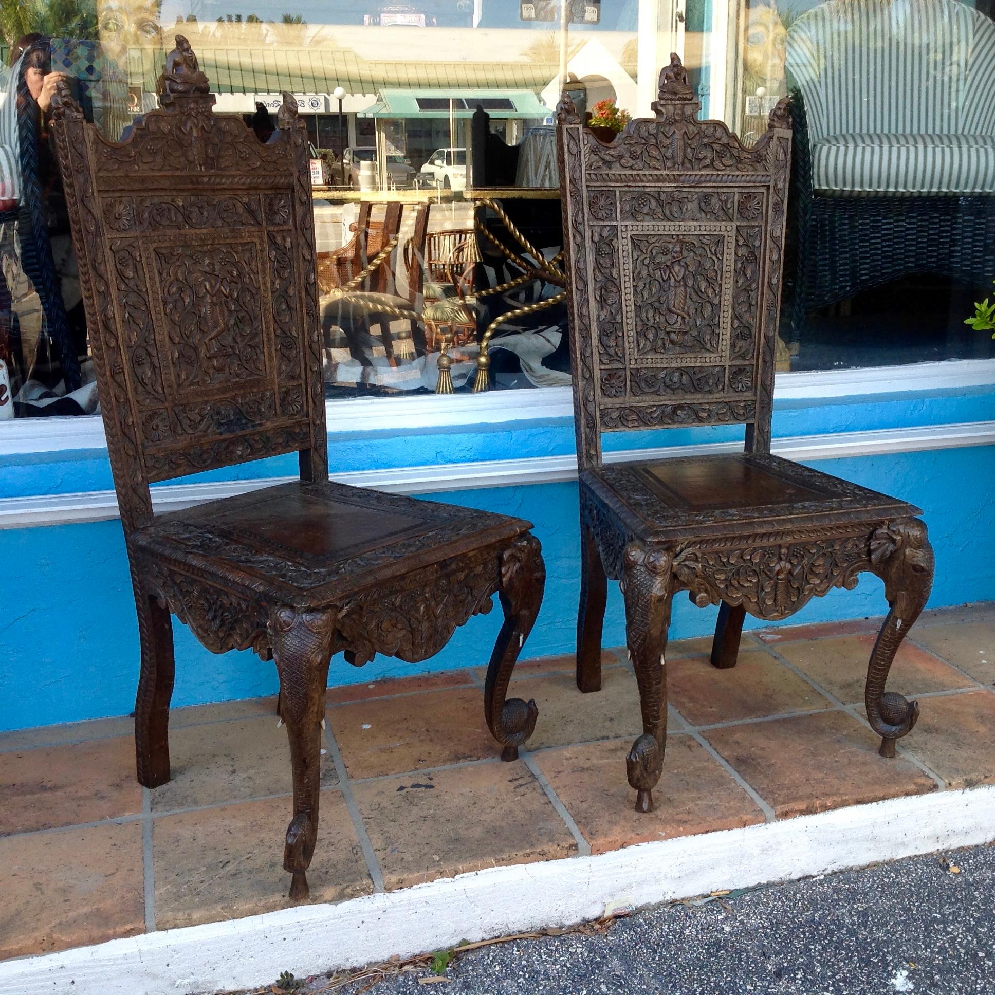 Superbly detailed with front legs designed as elephant heads and trunks.
The back rests are appointed with figures of musicians and ornately carved
with florals in the reverse.