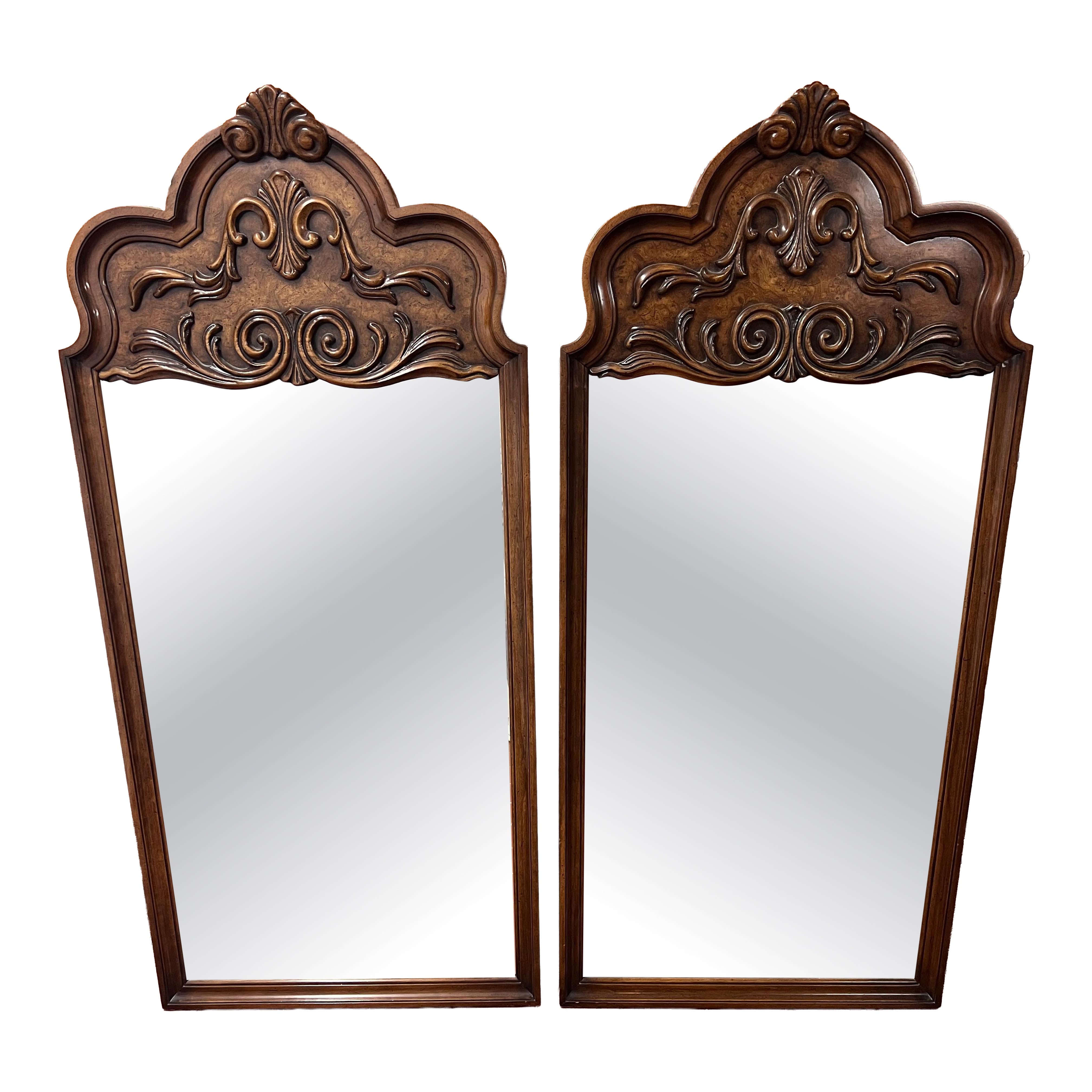 A Pair of Late 20th Century Elaborately Carved Wooden Mirrors