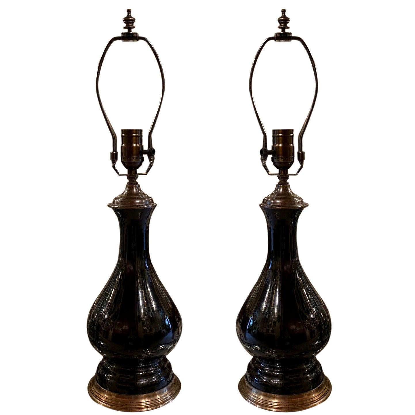 Pair of Electrified Black Glass Lamps