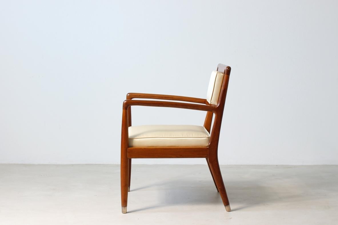Mid-Century Modern Pair of elegant 1950's chairs with armrests in turned walnut