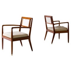 Pair of elegant 1950's chairs with armrests in turned walnut 