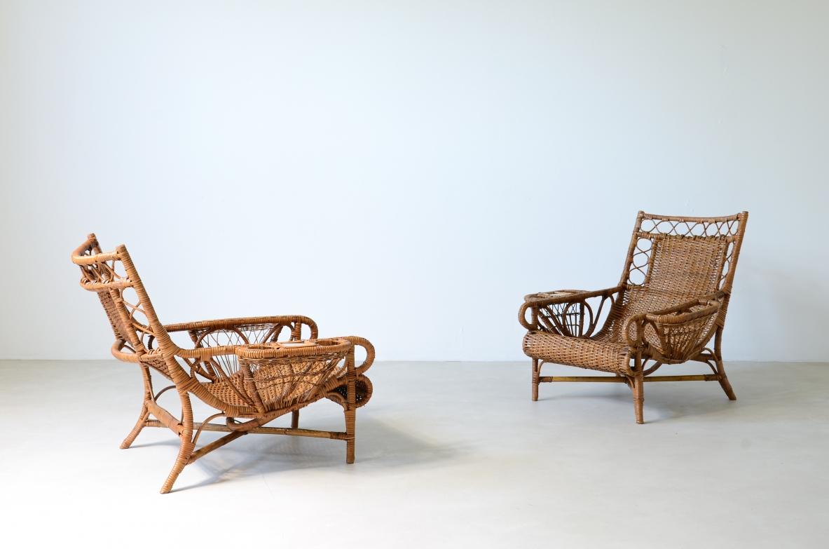 COD-2447
Pair of elegant willow armchairs with weaving on the seat and back as well as composed details, shapes and decorations. Italian manufacture 1950ca.

70 x 70 h 83 seat 30