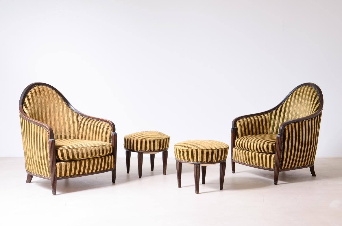 Francese Coppia di eleganti poltrone Art Déco in legno sagomato in vendita