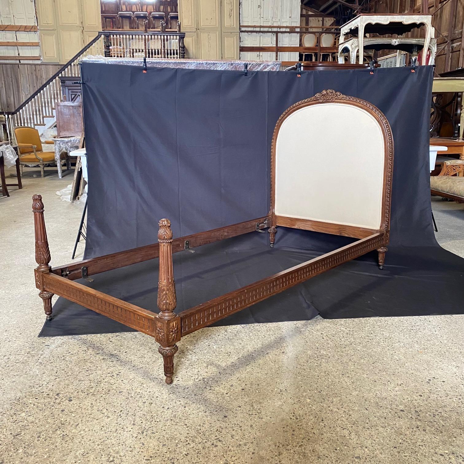 Pair of Elegant Carved Walnut French Louis XVI Upholstered Twin Beds In Good Condition In Hopewell, NJ