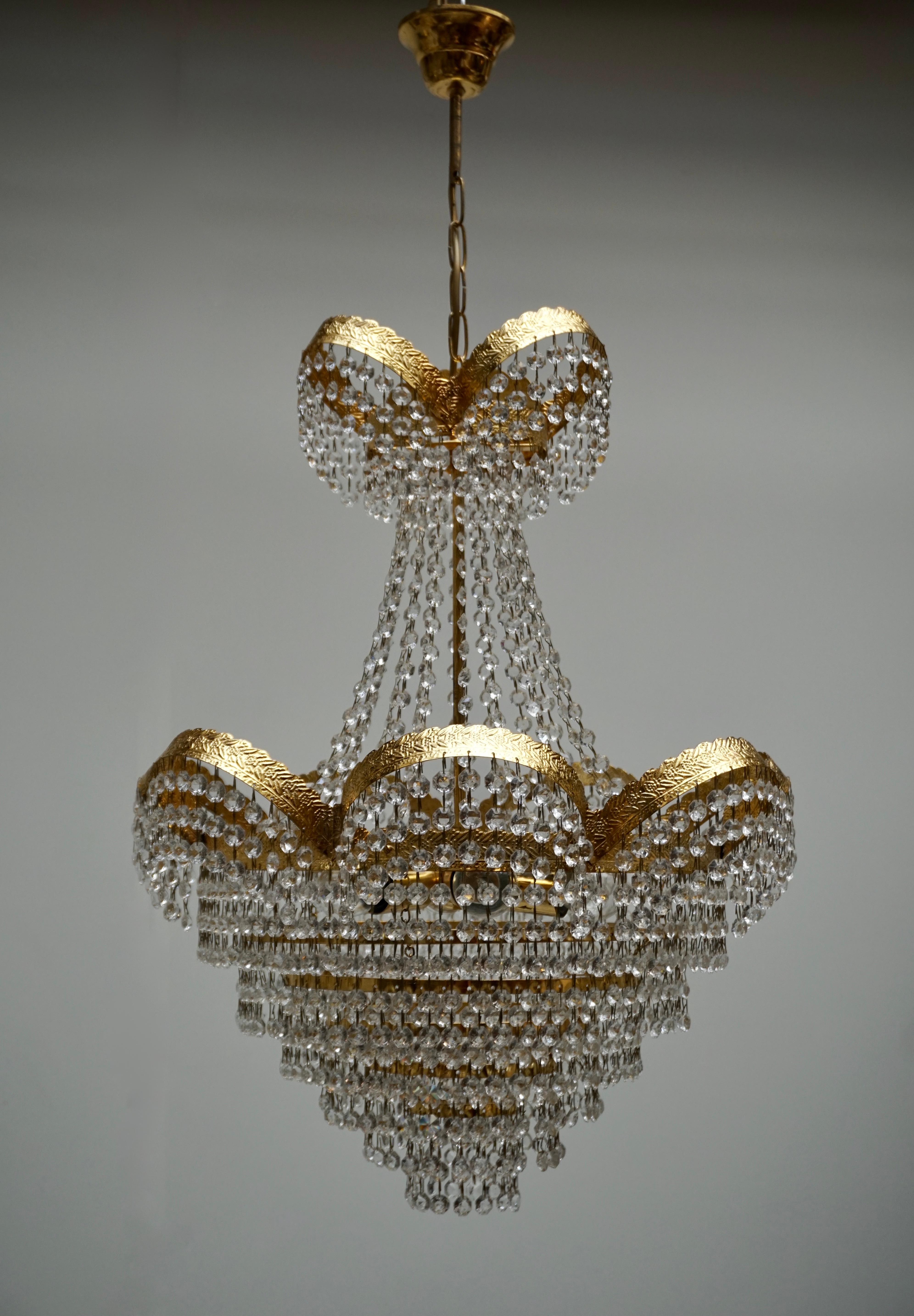 Italian One Elegant Crystal and Brass Chandelier For Sale