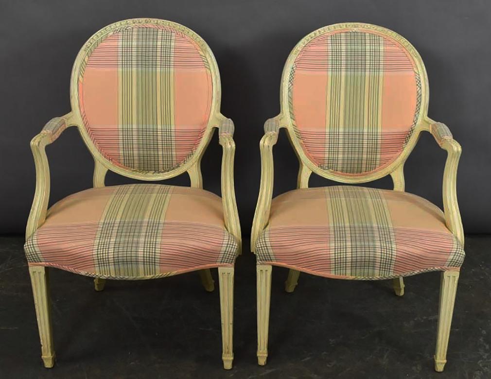- Elegant pair of fine of Louis XVI fauteuils
This pair of French Fauteuils features oval backs, scrolled and partially upholstered arms, 4 fluted and tapered legs typical of the Louis XVI decorative vocabulary.
Also, these chairs have wonderful