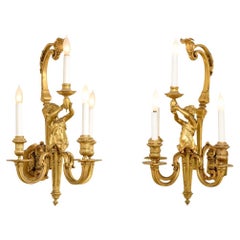 Pair Of Elegant French Neoclassical Style Figural Gilt Bronze Wall Sconces