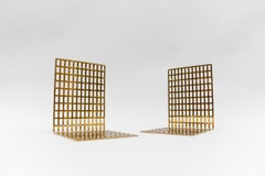 Coppia di eleganti reggilibri geometrici del metà del secolo scorso, Italia anni '70