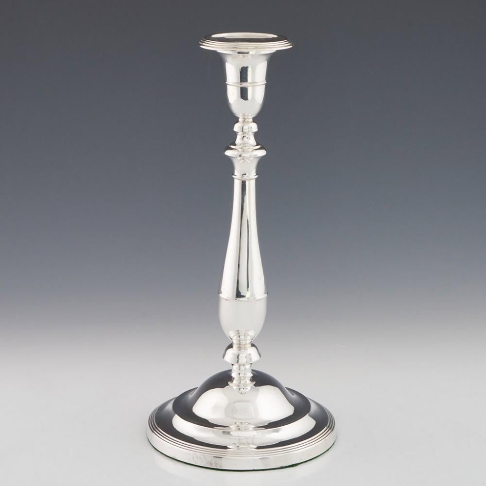 Pair of Elegant George III Sterling Silver Candlesticks, 1799

Additional Information:
Date: Hallmarked in Sheffiled in 1799 for Nathaniel Smith and Co.
Period: George III
Origin: Sheffield, Yorkshire, England
Decoration: Baluster shape with