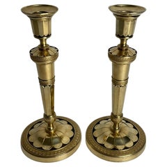 Paire d'élégants chandeliers Empire dorés et patinés, vers 1810