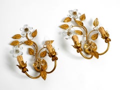 Pair of elegant gilded Italian 1970s floral Regency Murano glass wall lamps