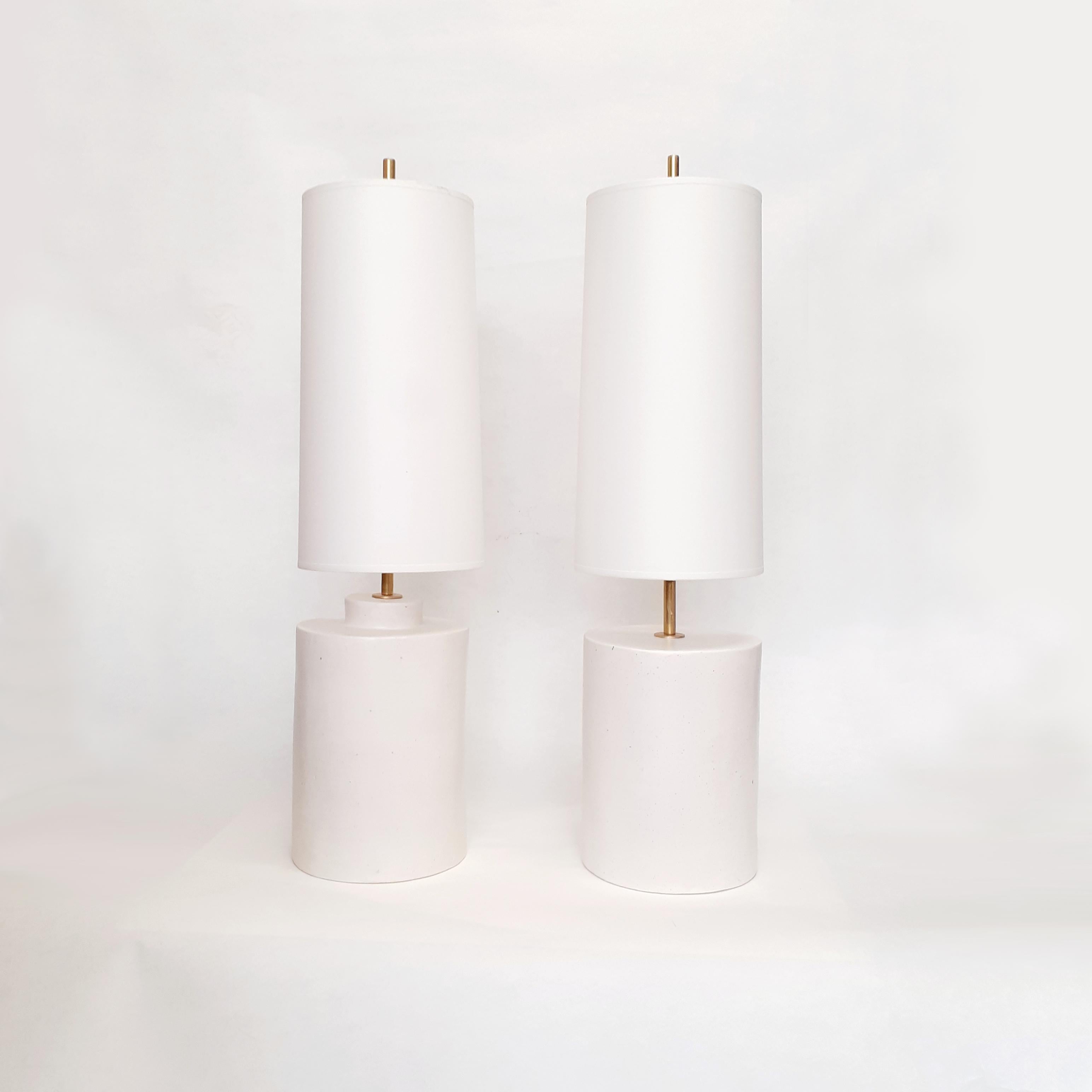 Pair of ceramic lamps with shade, handmade in Parisian workshop by Elsa Foulon Studio.
Chic and minimalist design.
Cotton shade, brass structure, soft white enameled ceramic, screw bulb. 
UL Listed electricity on request.

All of our items are