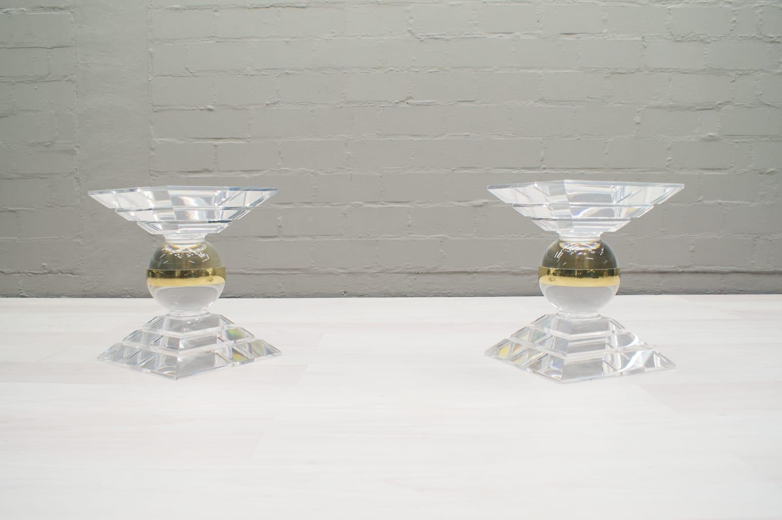 Pair of heavy plexiglass side tables from Italy. 
Look very elegant and light, but are fully acrylic.
 