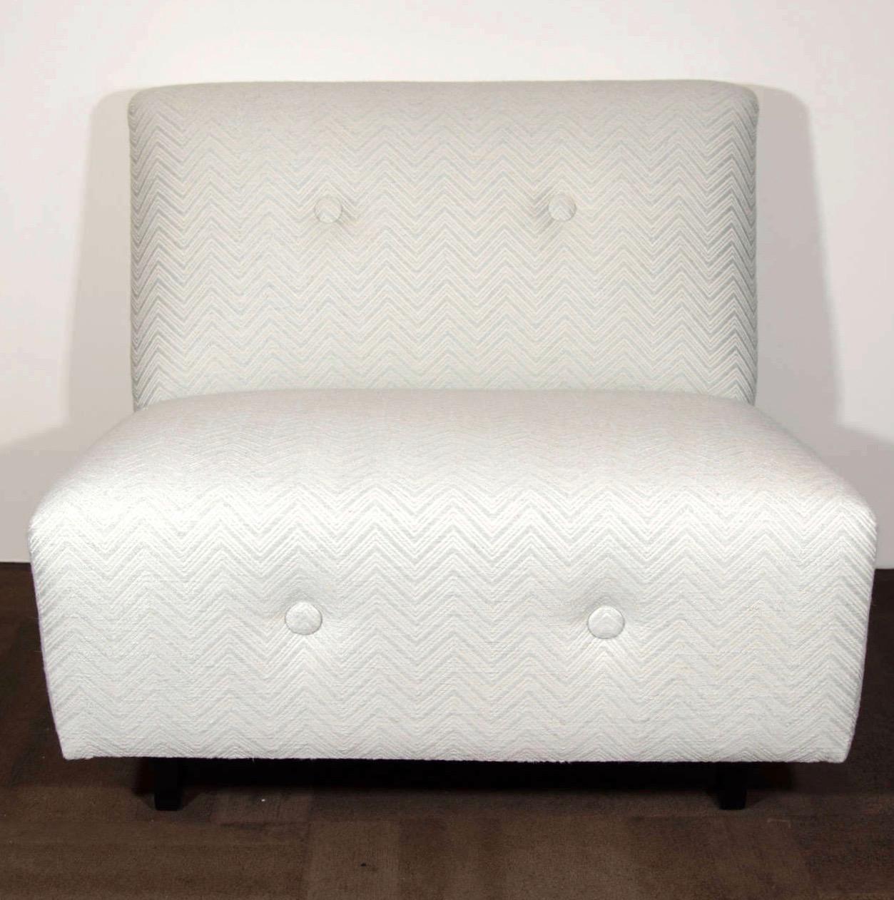 Pair of Art Deco slipper chairs upholstered in woven Scalamandre fabric with a gorgeous chevron pattern in hues of ivory and matte silver. The chairs have large classic square back and seat design Features large button accents along the back and