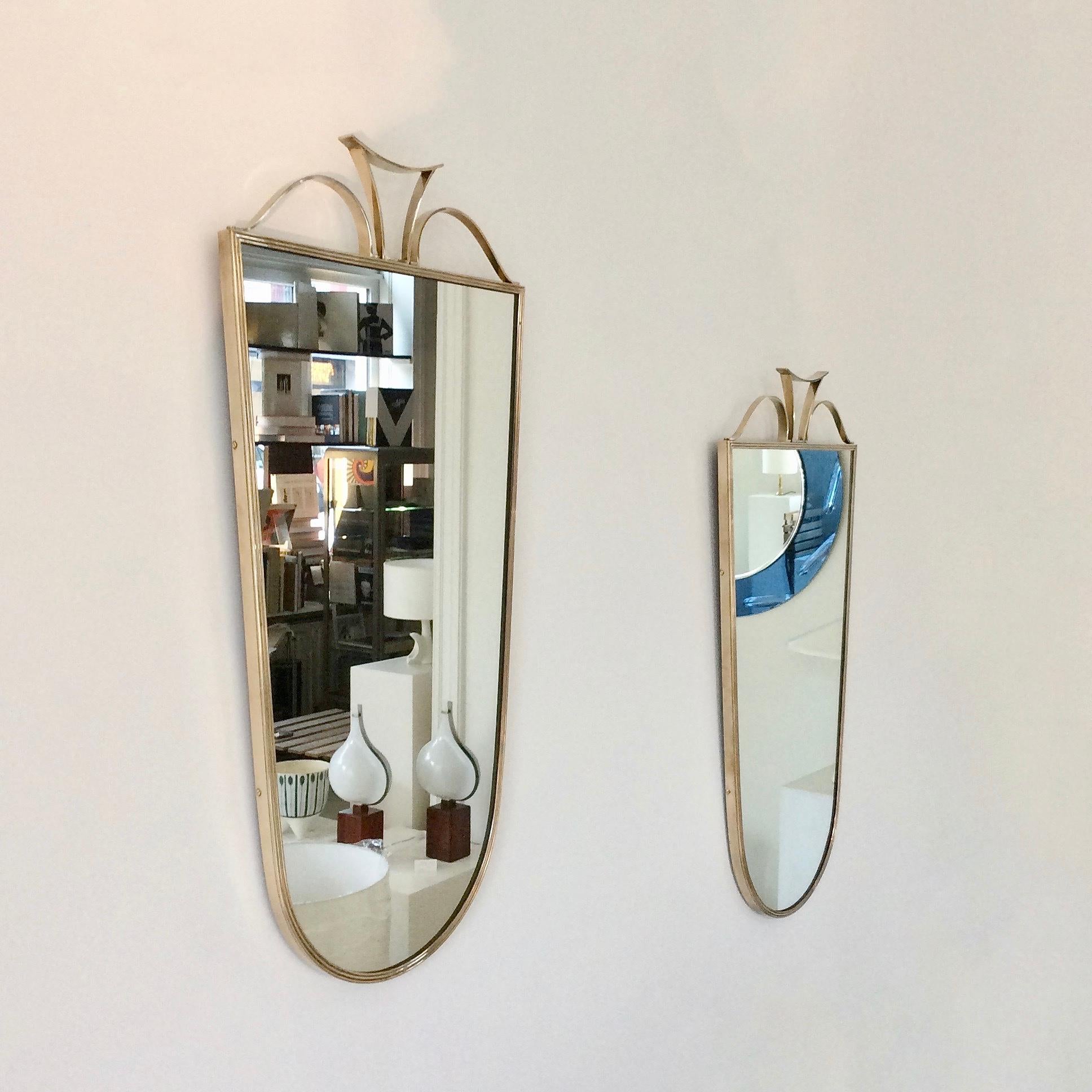 Very elegant pair of wall mirrors, circa 1950, Italy.
Brass and mirrored glass, possibly produced by Fontana Arte.
Good original vintage condition, nice quality.
All purchases are covered by our Buyer Protection Guarantee.
This item can be returned