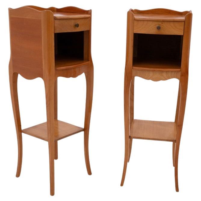 Pair of elegant narrow bedside tables.