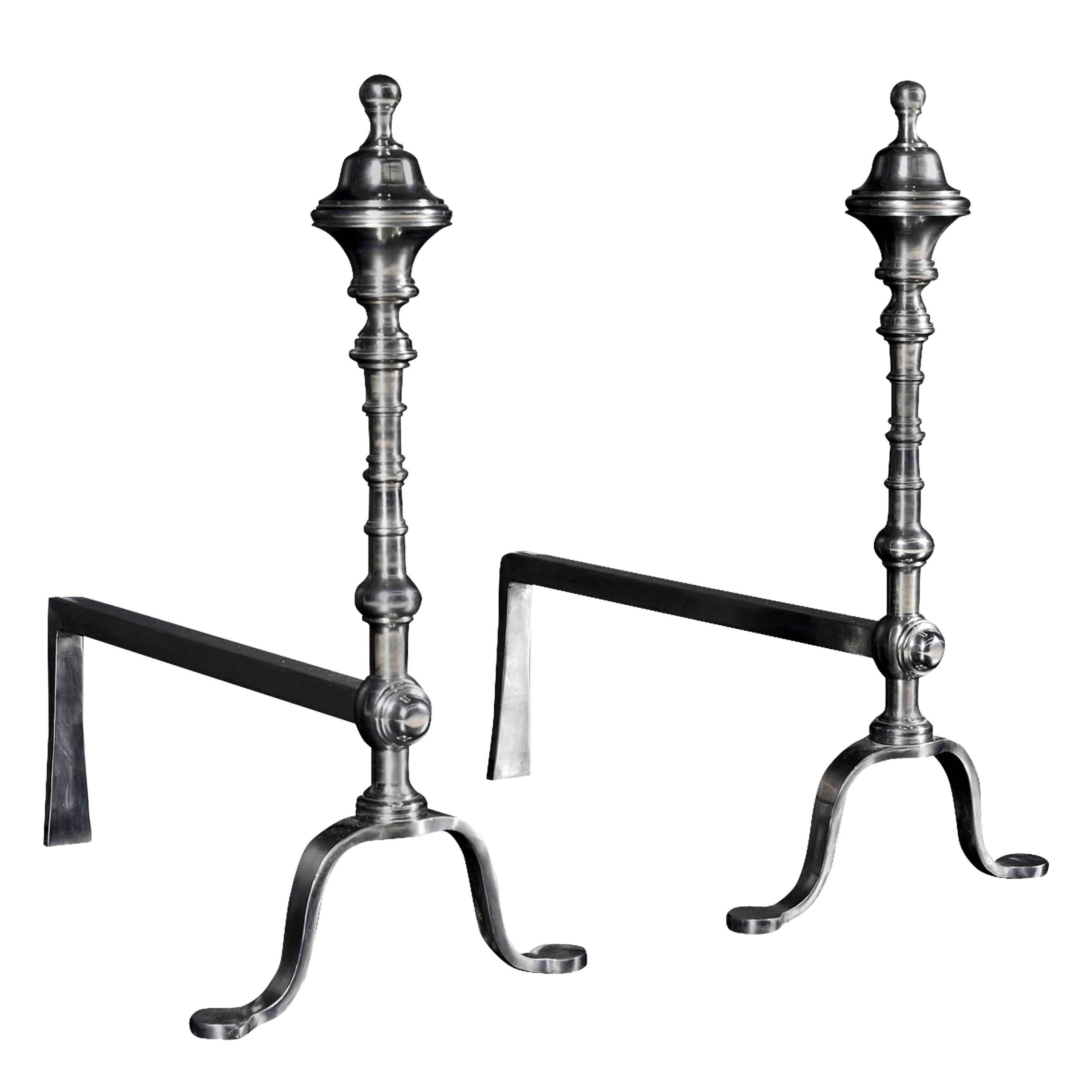 Pair of Elegant Polished Steel Firedogs For Sale