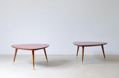 Pair of elegant semi-triangular shaped coffee tables