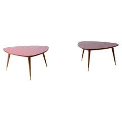 Pair of elegant semi-triangular shaped coffee tables