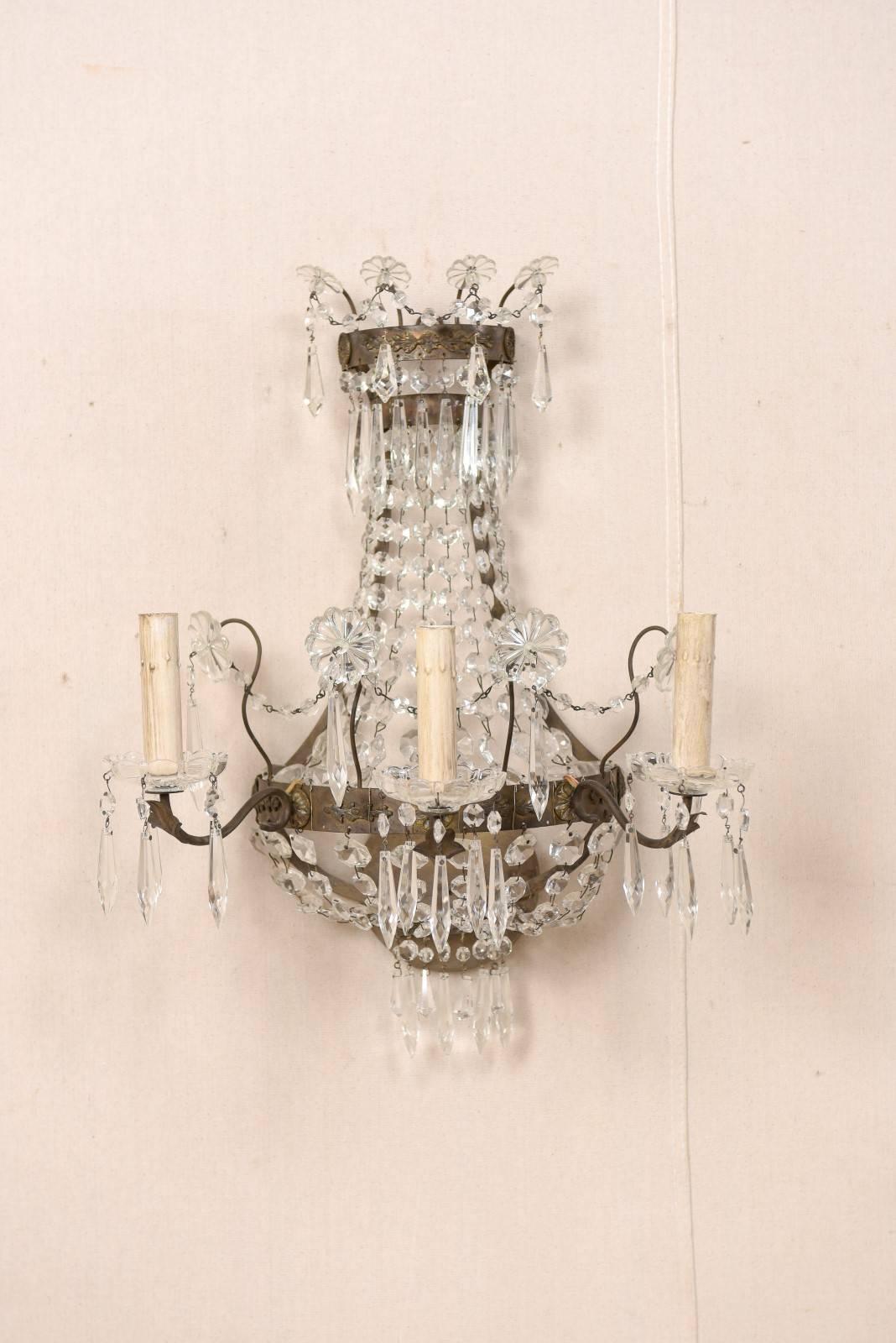 Patinated Pair of Elegant Swedish Three-Light Crystal and Cut Class Wall Sconces