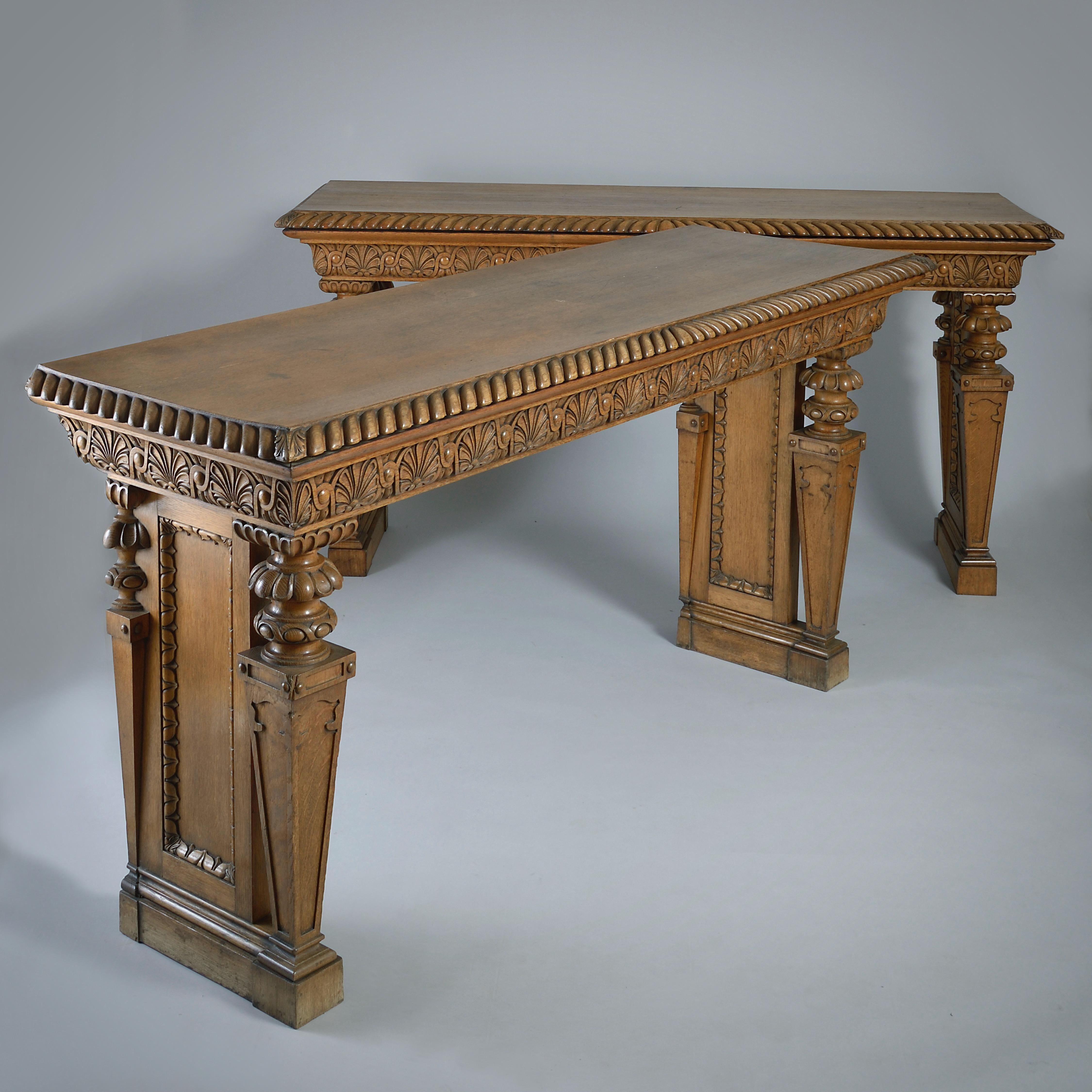 A fine pair of early Victorian Elizabethan-revival oak side tables, circa 1840.

Measures: 37.5in. (95cm) high; 74.5in. (189cm) wide; 24.25in. (61cm) deep.