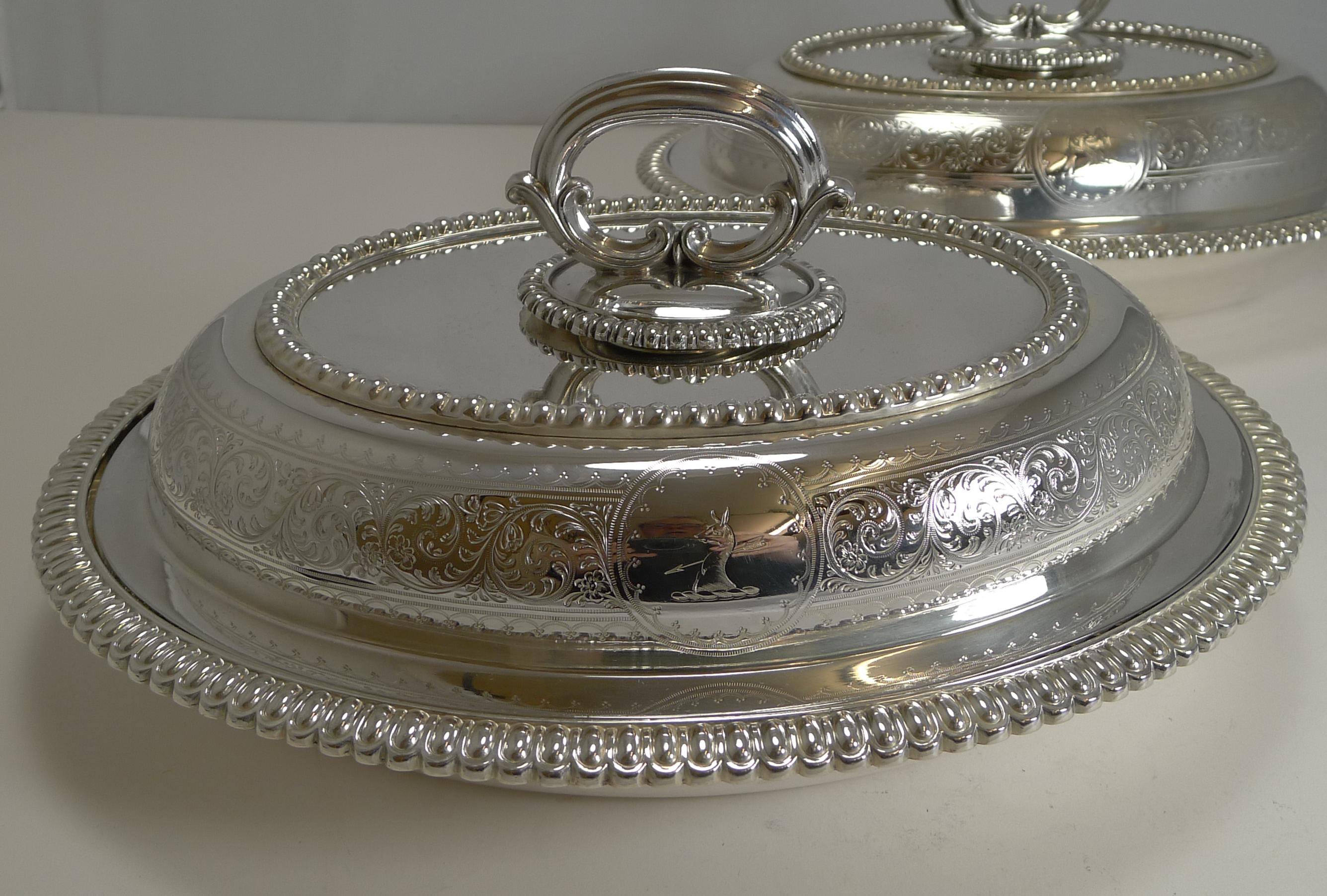 A lovely pair of Victorian entree dishes, made from silver plate by the top-notch silversmith, Elkington and Co. of Birmingham.

Being Elkington, it allows us to date them accurately from the date letter Y for the year 1884.

The removable