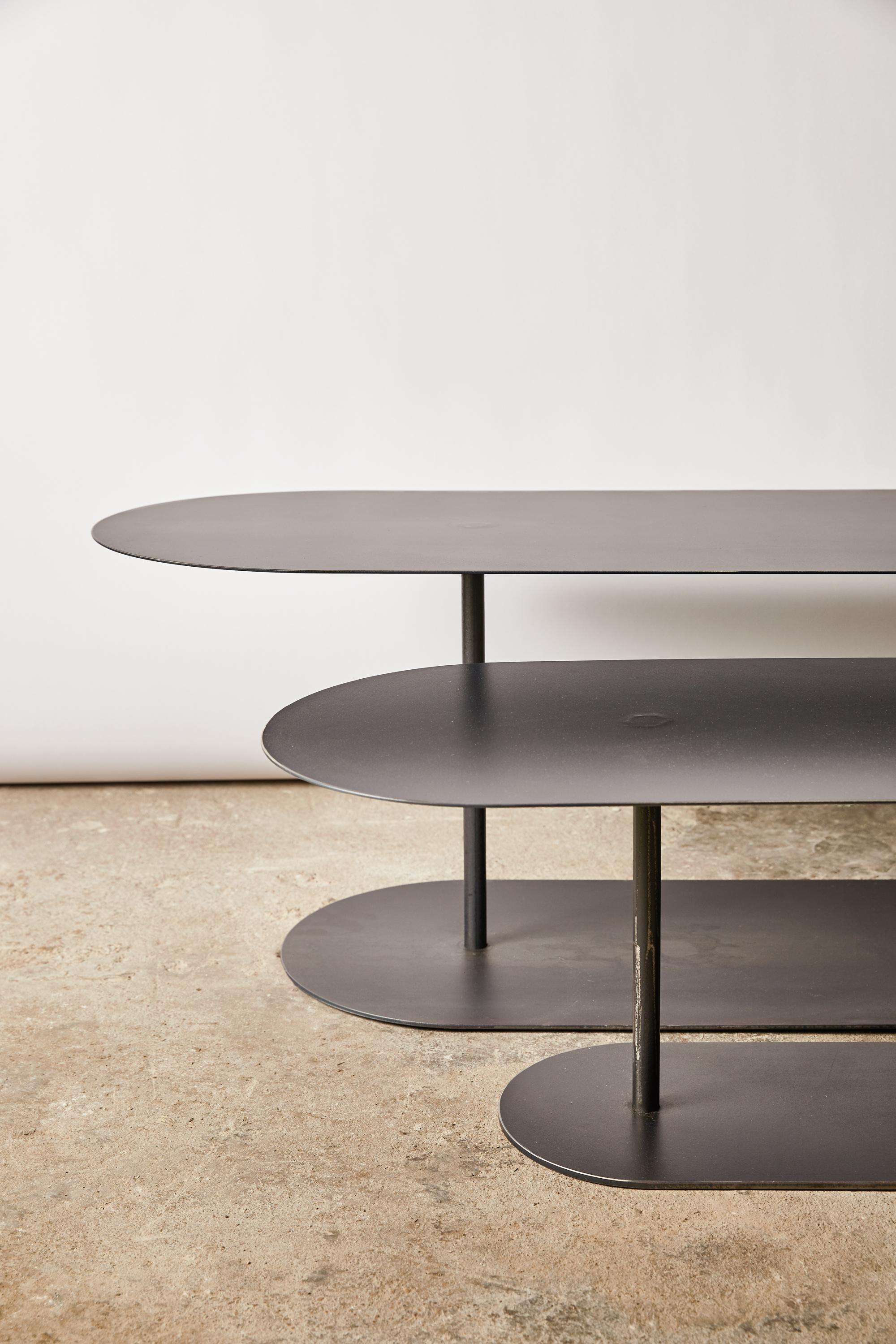 Pair of Ellipses tables signed by Pia Chevalier
Also available in oxidized steel.
Dimensions:
Large: 120 x 40 cm h. 40 cm
Small: 90 x 30 cm h. 35 cm

Exists also in smaller version:
Large: 60 x 27 cm H. 45 cm
Small: 40 x 18 cm H. 40