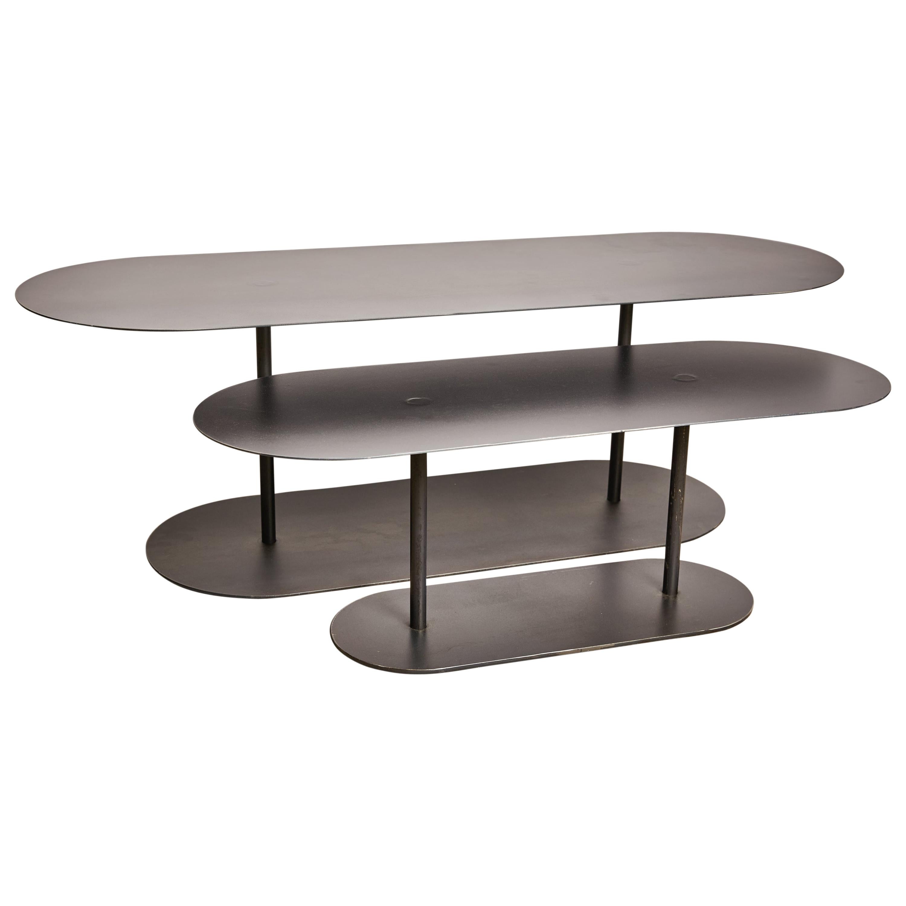 Paire de tables Ellipses signées par Pia Chevalier en vente