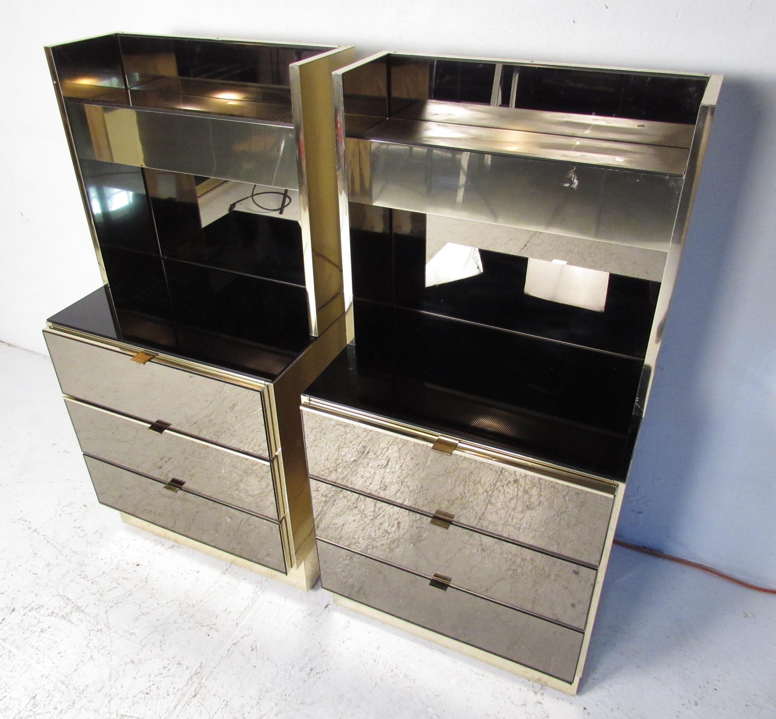 Rare pair of Ello three-drawer smoked mirrored nightstands with freestanding mirrored lighting unit on top. Fixture has a prismatic lens on bottom and frosted glass shelf on top. They are wired to turn on/off as a pair or separately. Please confirm