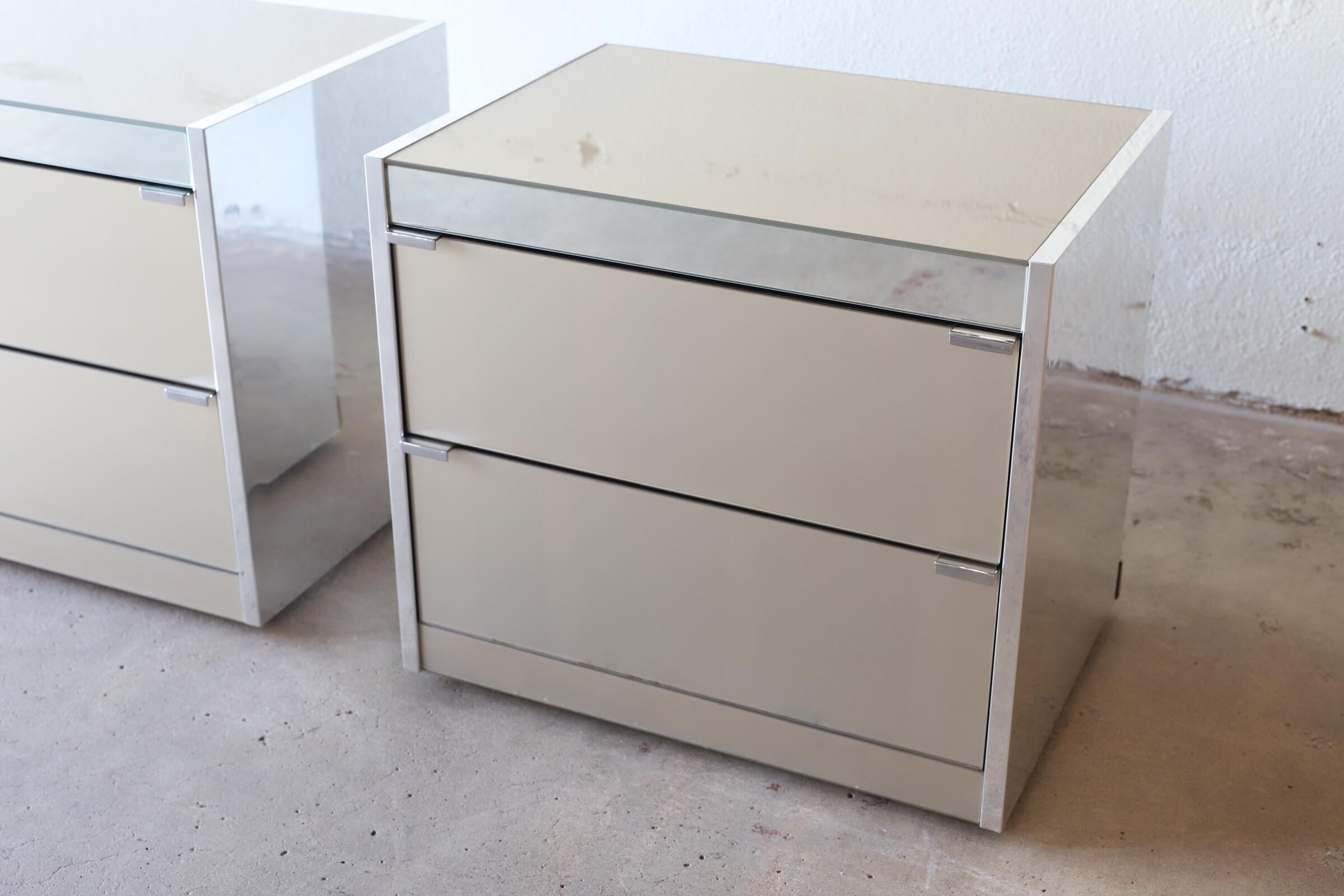 Mirrored nightstands by O.B. Solie for Guy Barke by Ello. Made of stainless steel and mirror. These are built to the highest standard. A must have in any modern home.