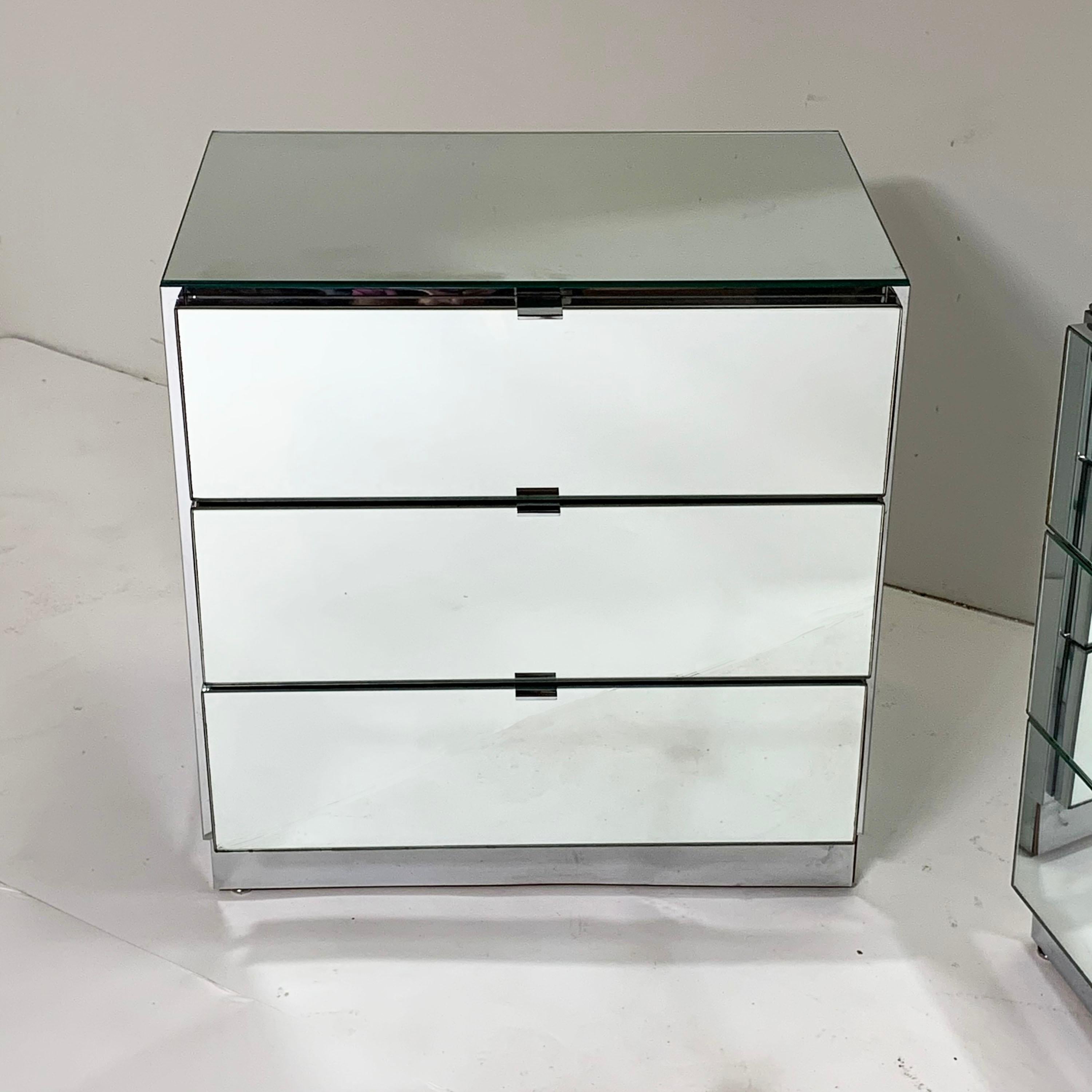 Pair of three-drawer cabinets or nightstands by Ello Furniture in mirrored glass and chrome, circa 1980s.