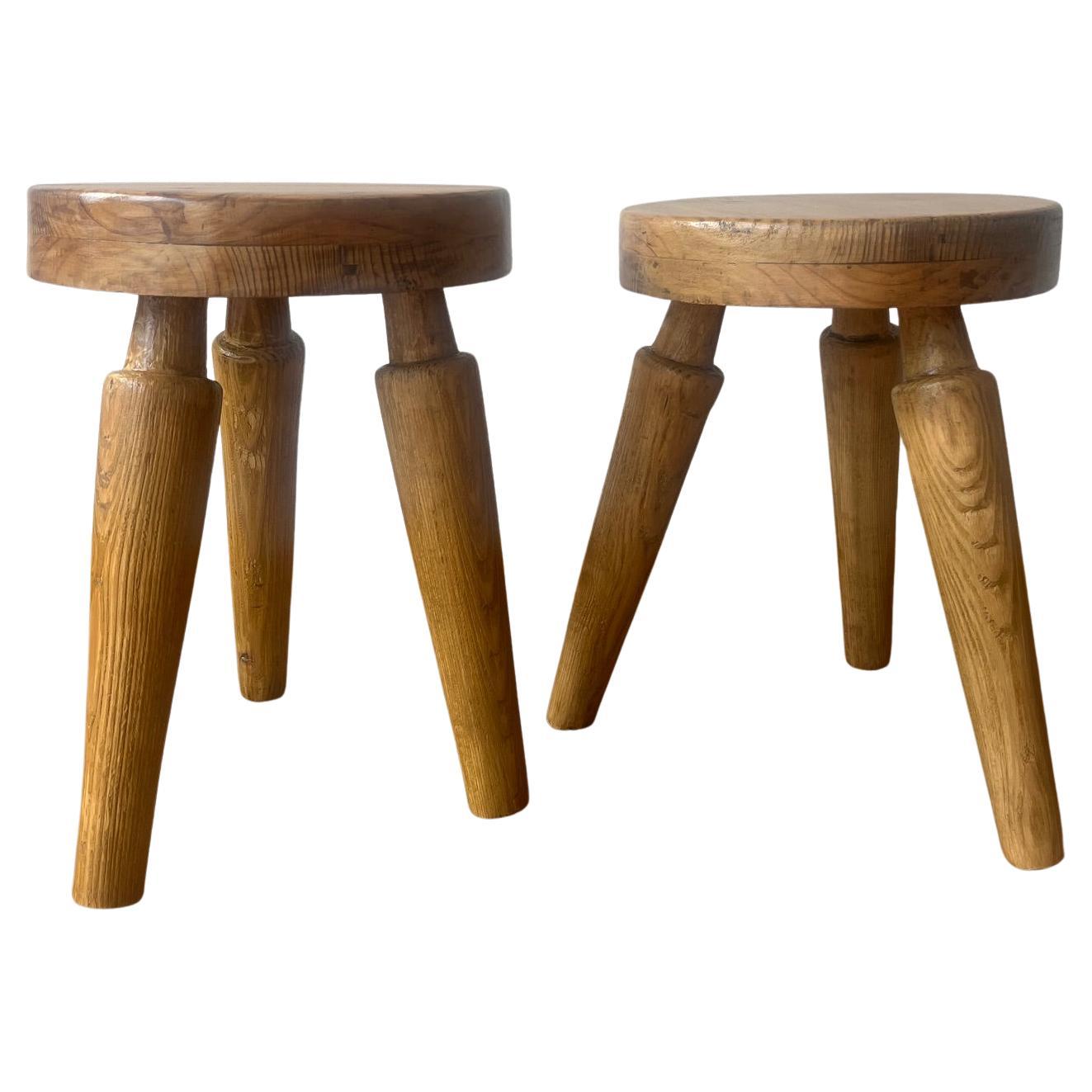 Pair of elm and pine tripod stools, France 1960's For Sale