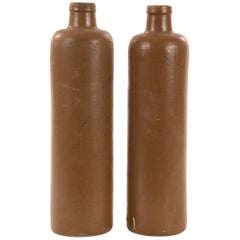 Pair of Elongated Brown Glazed Stoneware Bottles