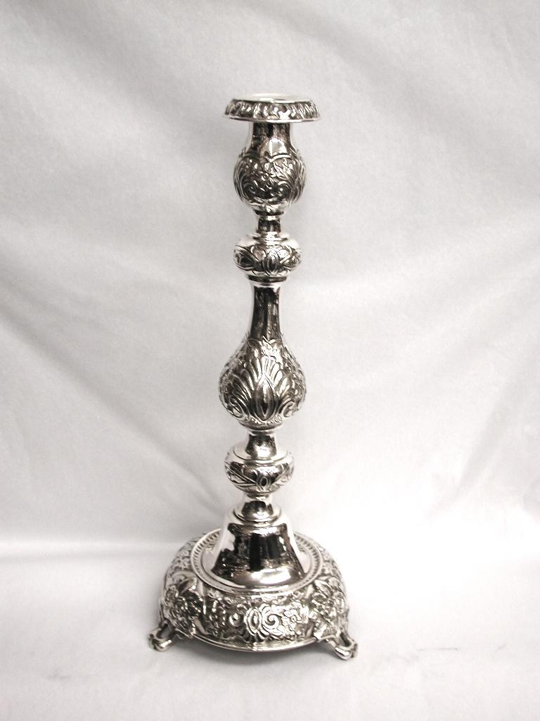 Pair of embossed silver candlesticks, 1902, London Assay, Salkind & Koshr.
Very heavy quality pair of Sabbath candlesticks with a total weight of 31.75 troy ounces, and a height of 14.75 inches.
Salkind & Koshr were known for making Judaica at the