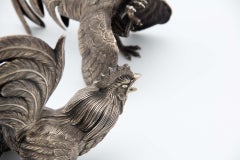 Pair of embossed silver fighting roosters