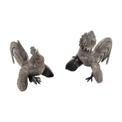 Pair of embossed silver fighting roosters